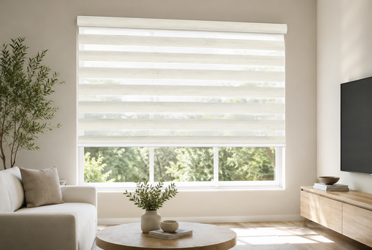 White zebra blinds filtering light in a modern living room