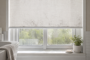 Condensation causing small mold spots on a roller blind