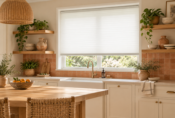 Boho kitchen with white window shades and warm wood accents