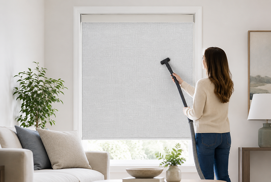 Vacuuming fabric blinds with a soft brush
